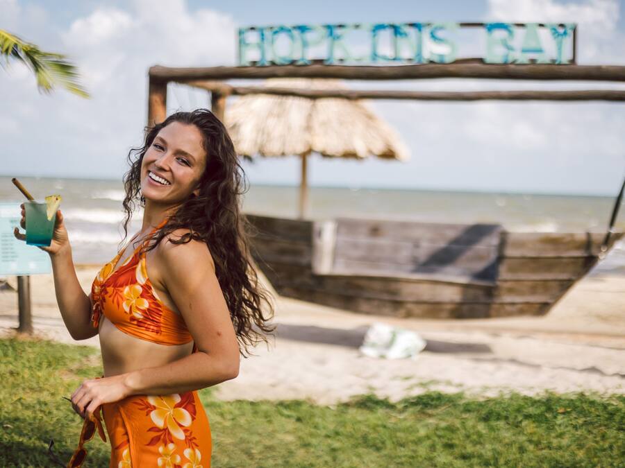 A beach scene with a wooden structure labeled "HOPES HIGH".