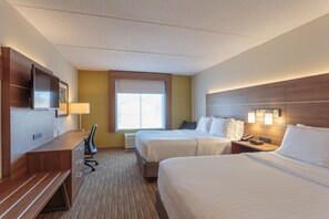 A hotel room with two beds, a desk with a chair, a television, and a window with blinds. - Holiday Inn Express & Suites Belleville by IHG (Belleville)