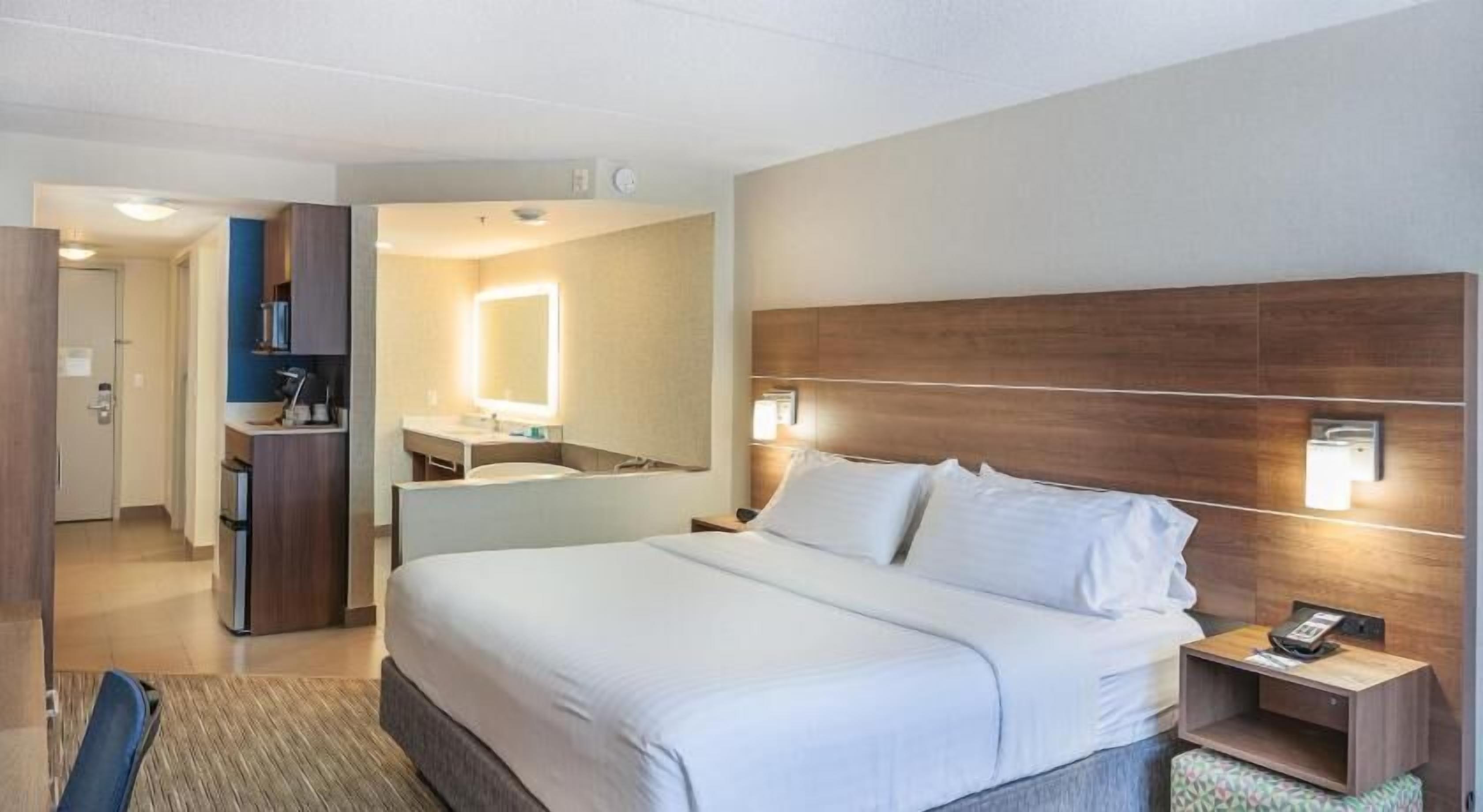 Desk, laptop workspace, blackout drapes, iron/ironing board