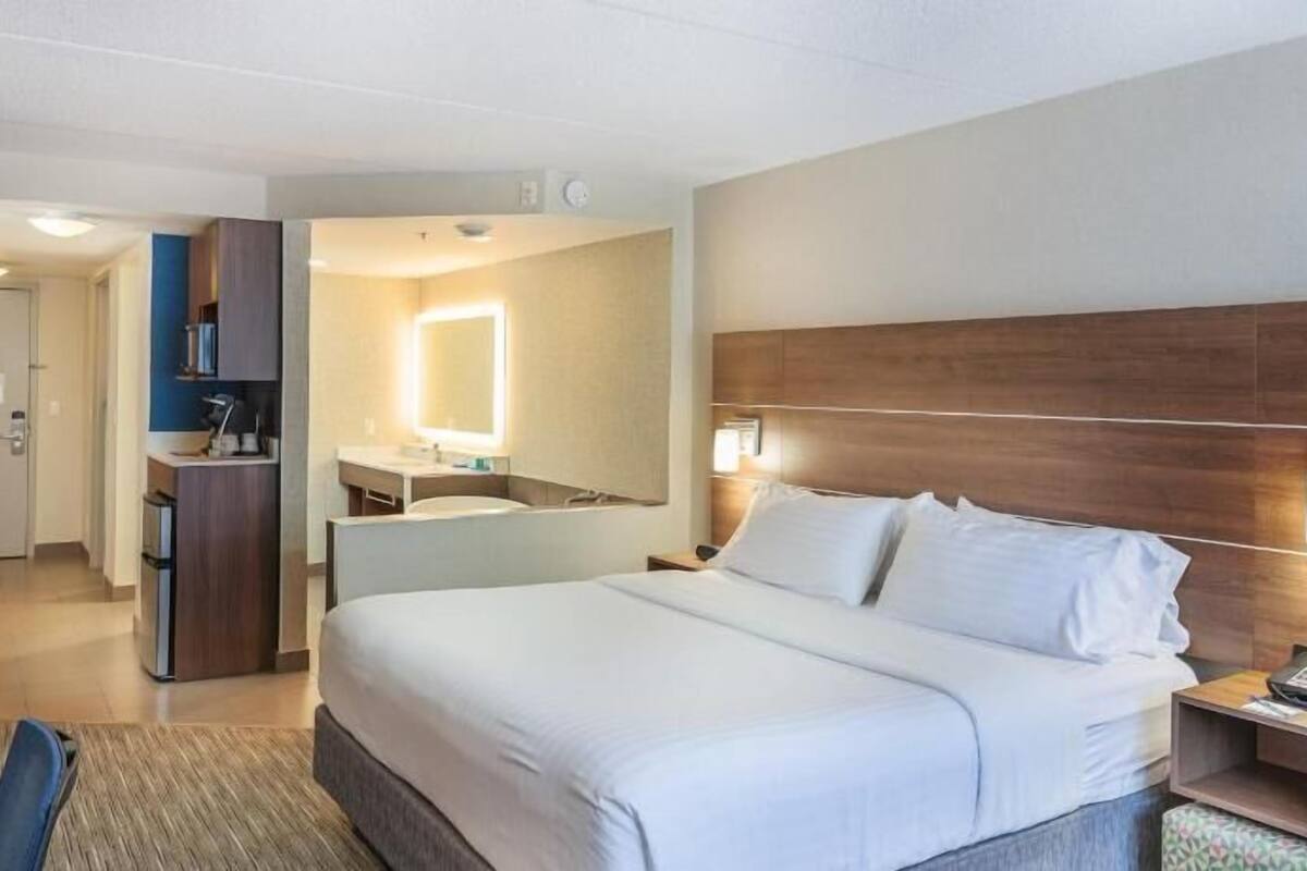 Desk, laptop workspace, blackout drapes, iron/ironing board