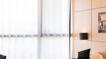 Dobbelt- eller tomannsrom – superior | Safe på rommet, skrivebord, strykejern/-brett og barnesenger (inkludert)