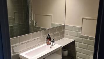 Hair dryer, towels, soap, shampoo