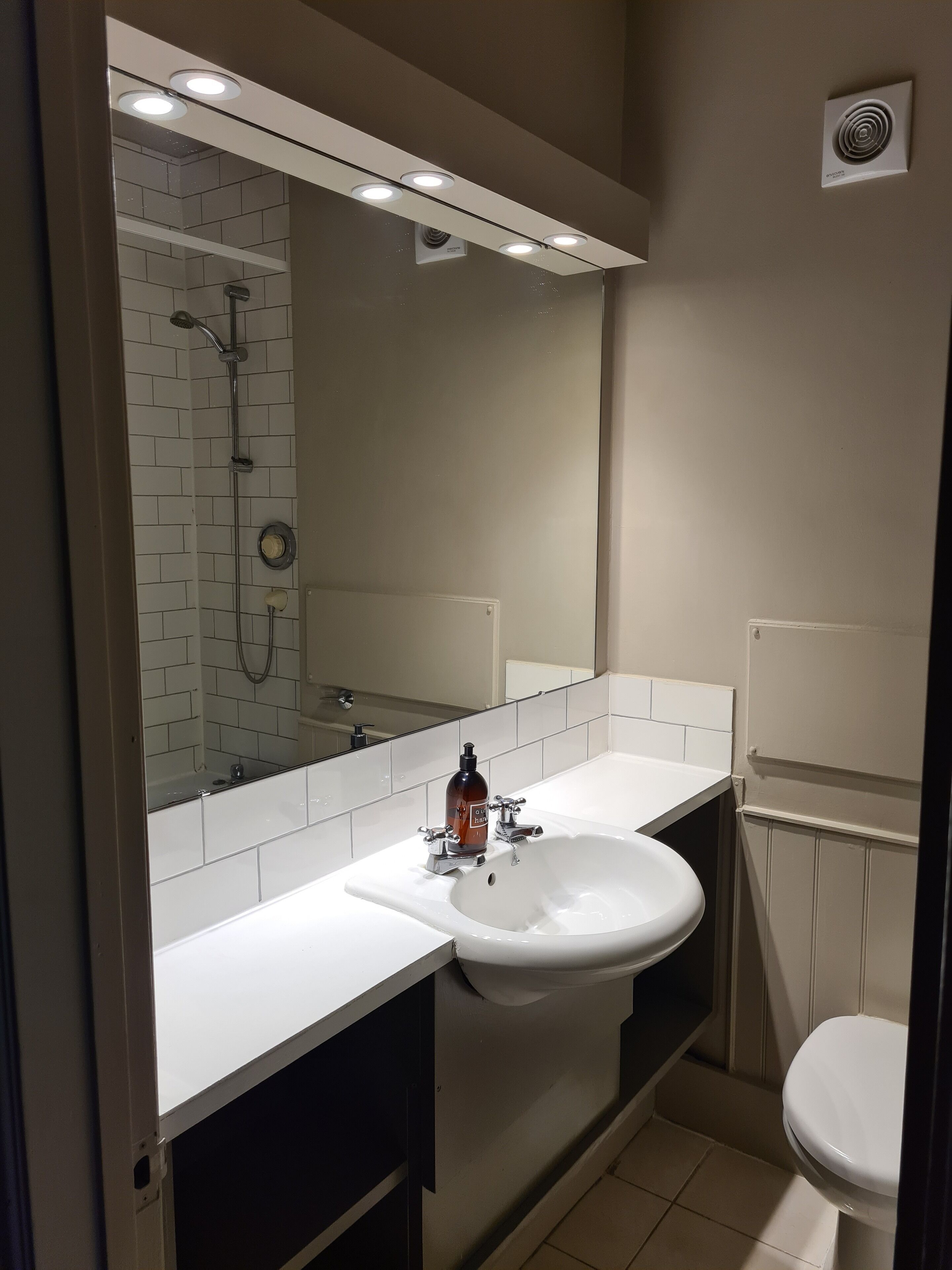 Hair dryer, towels, soap, shampoo