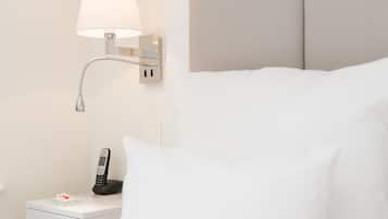 Business Suite | Premium bedding, in-room safe, individually decorated, desk