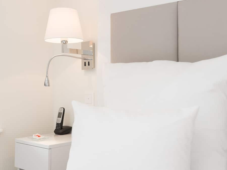 Business Suite | Premium bedding, in-room safe, individually decorated, desk