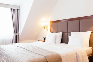 Premium bedding, in-room safe, individually decorated, desk