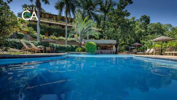 Outdoor pool, pool umbrellas, sun loungers