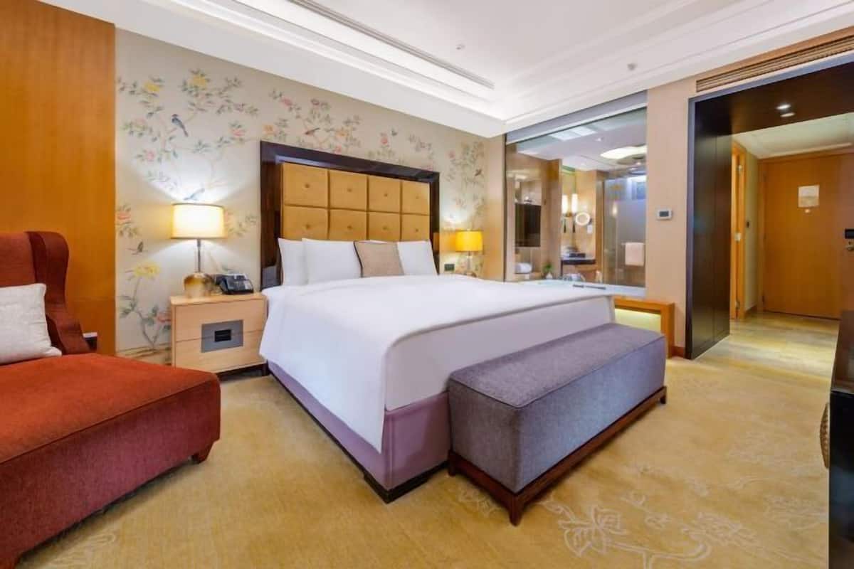Premium bedding, down duvets, Select Comfort beds, minibar