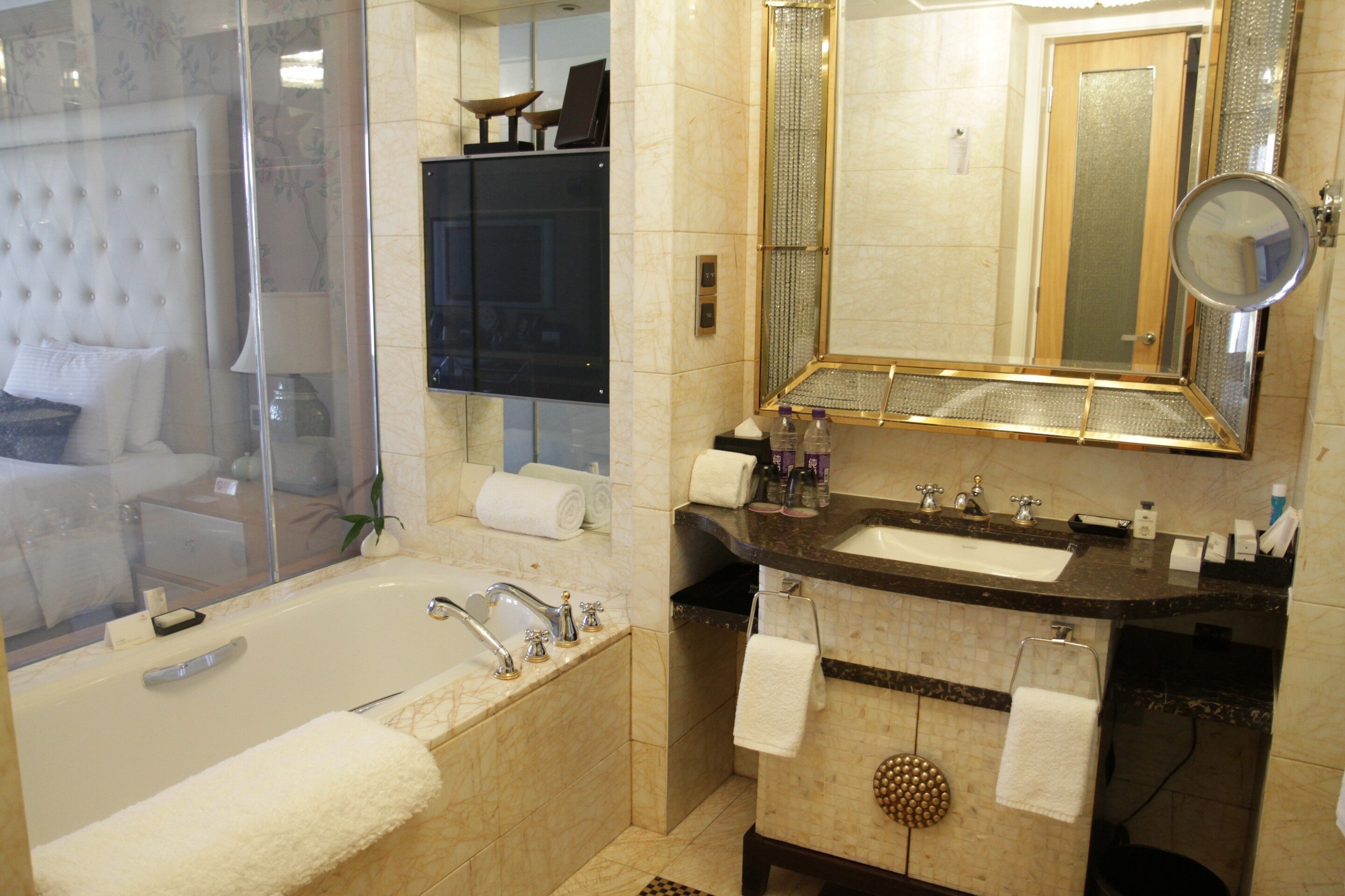 separate bathtub and shower, deep-soaking bathtub, rainfall showerhead