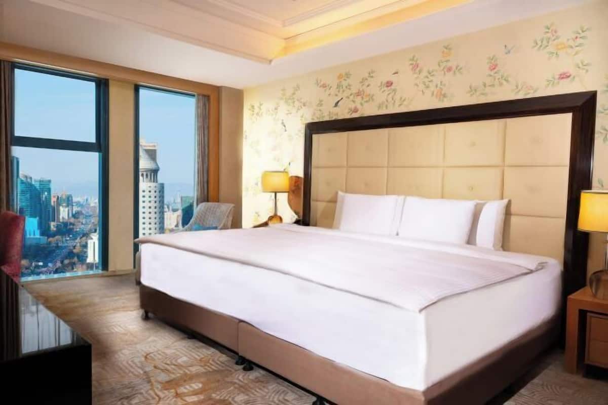 Premium bedding, down duvets, Select Comfort beds, minibar