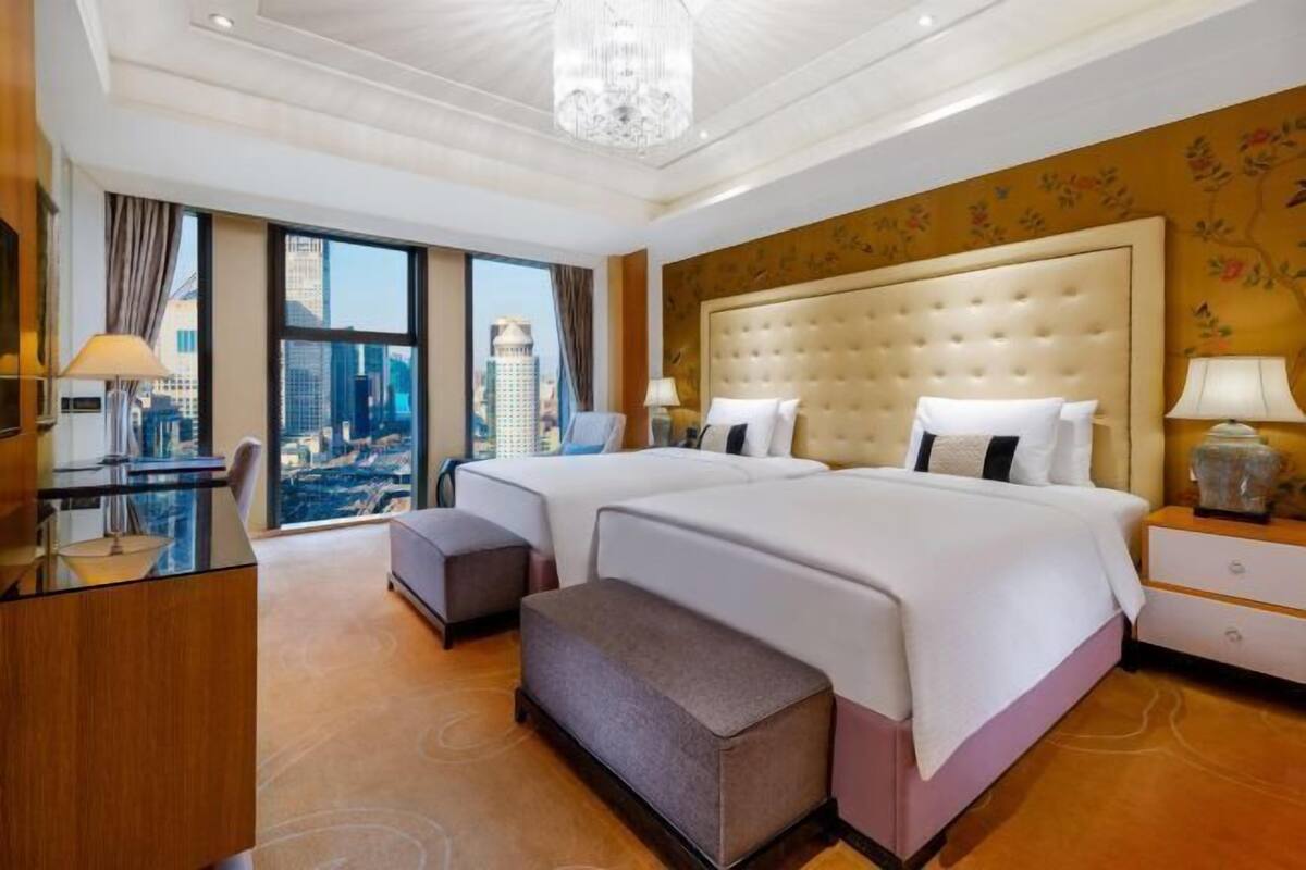 Premium bedding, down duvets, Select Comfort beds, minibar