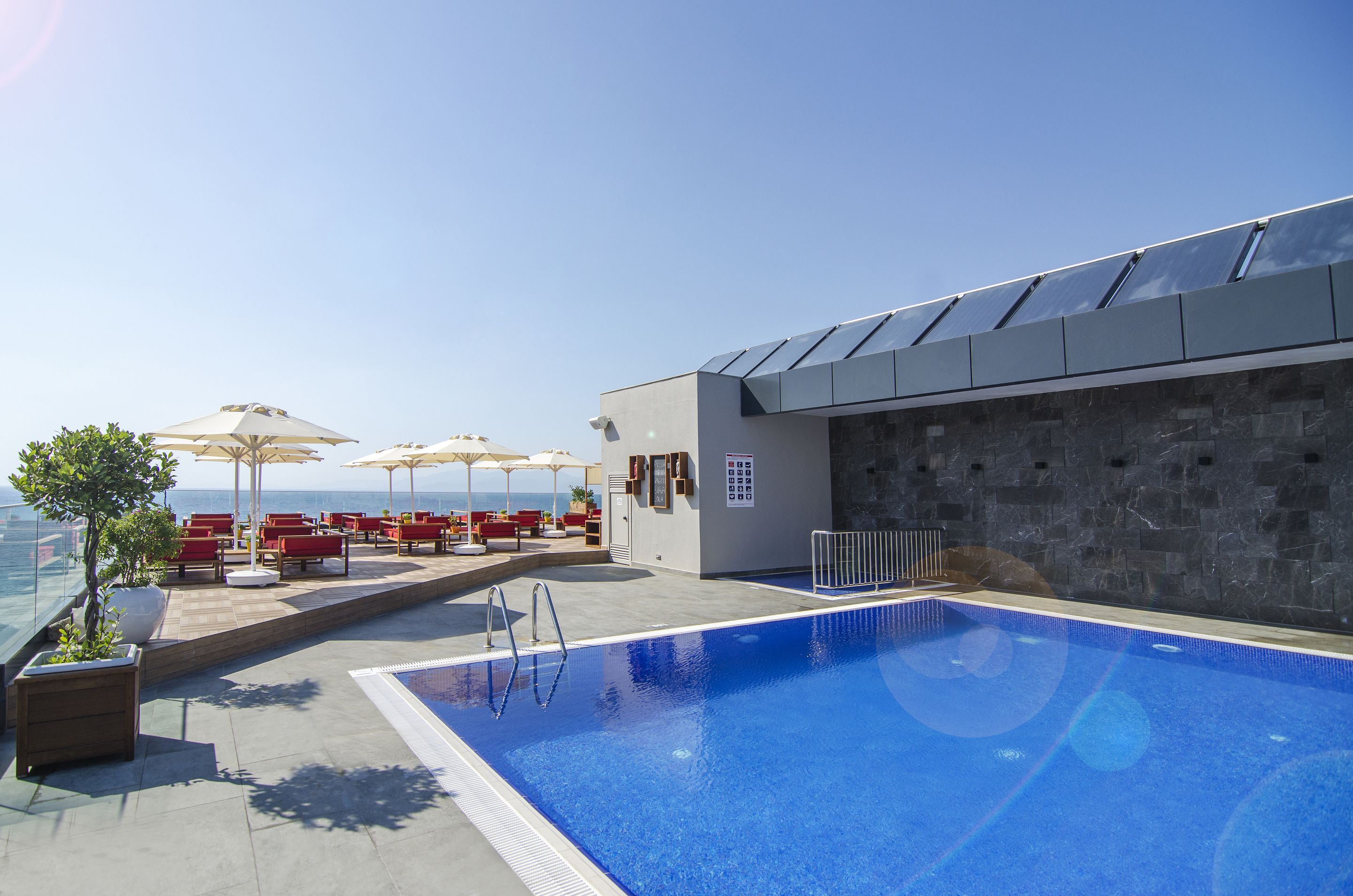 Outdoor pool, pool umbrellas, sun loungers