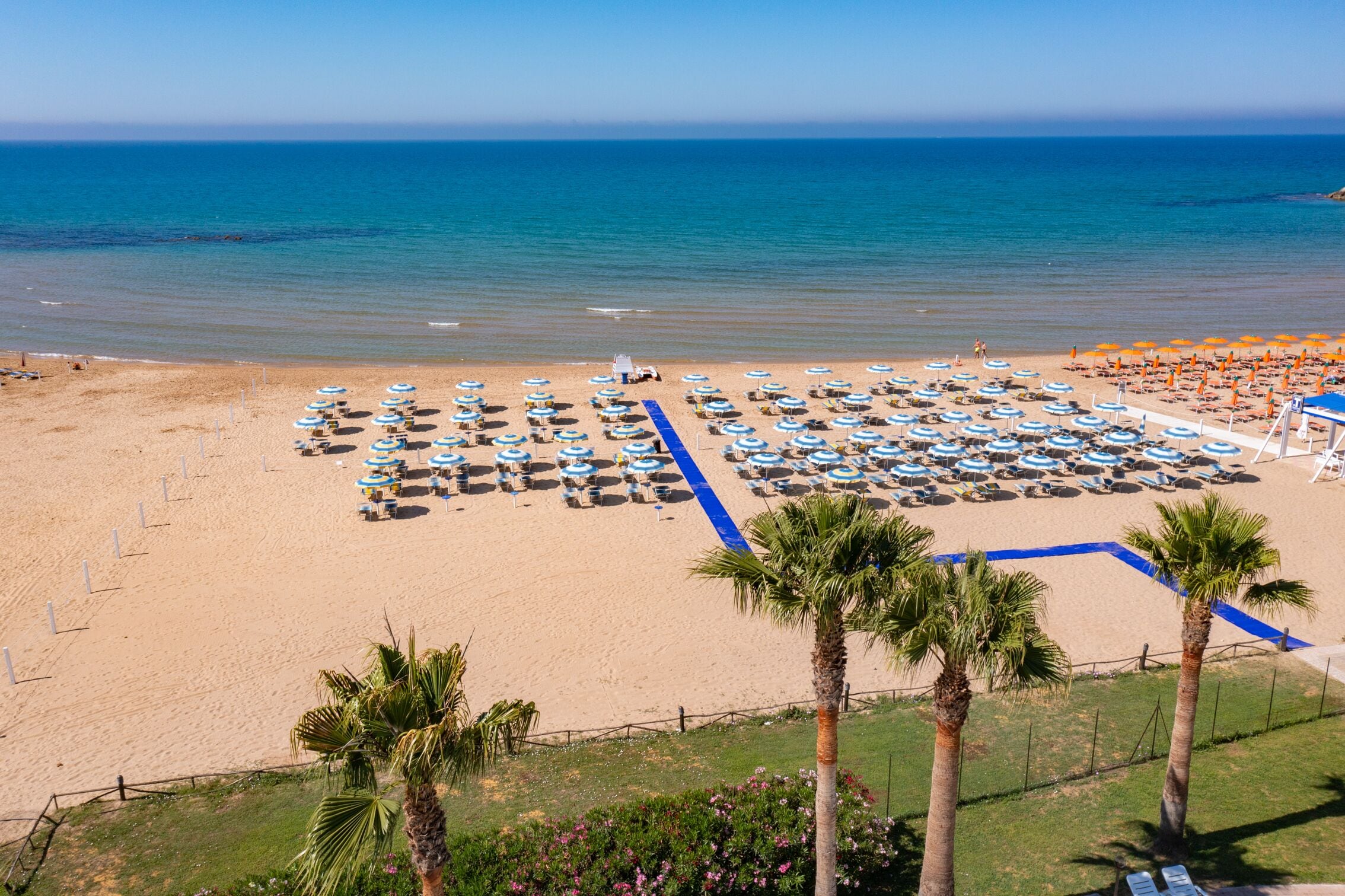 Private beach, white sand, sun-loungers, beach umbrellas