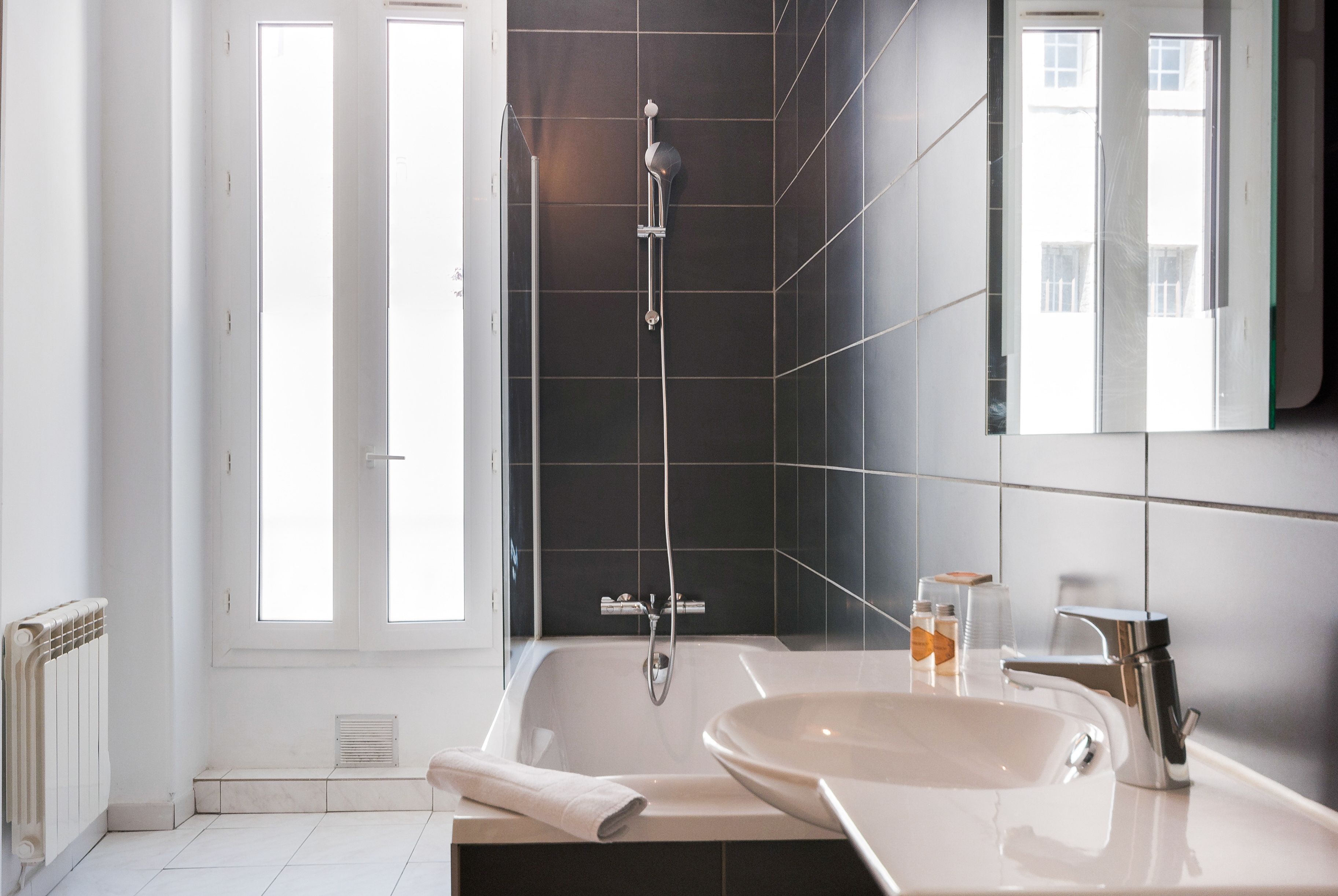 superior room | bathroom | shower, hair dryer, towels