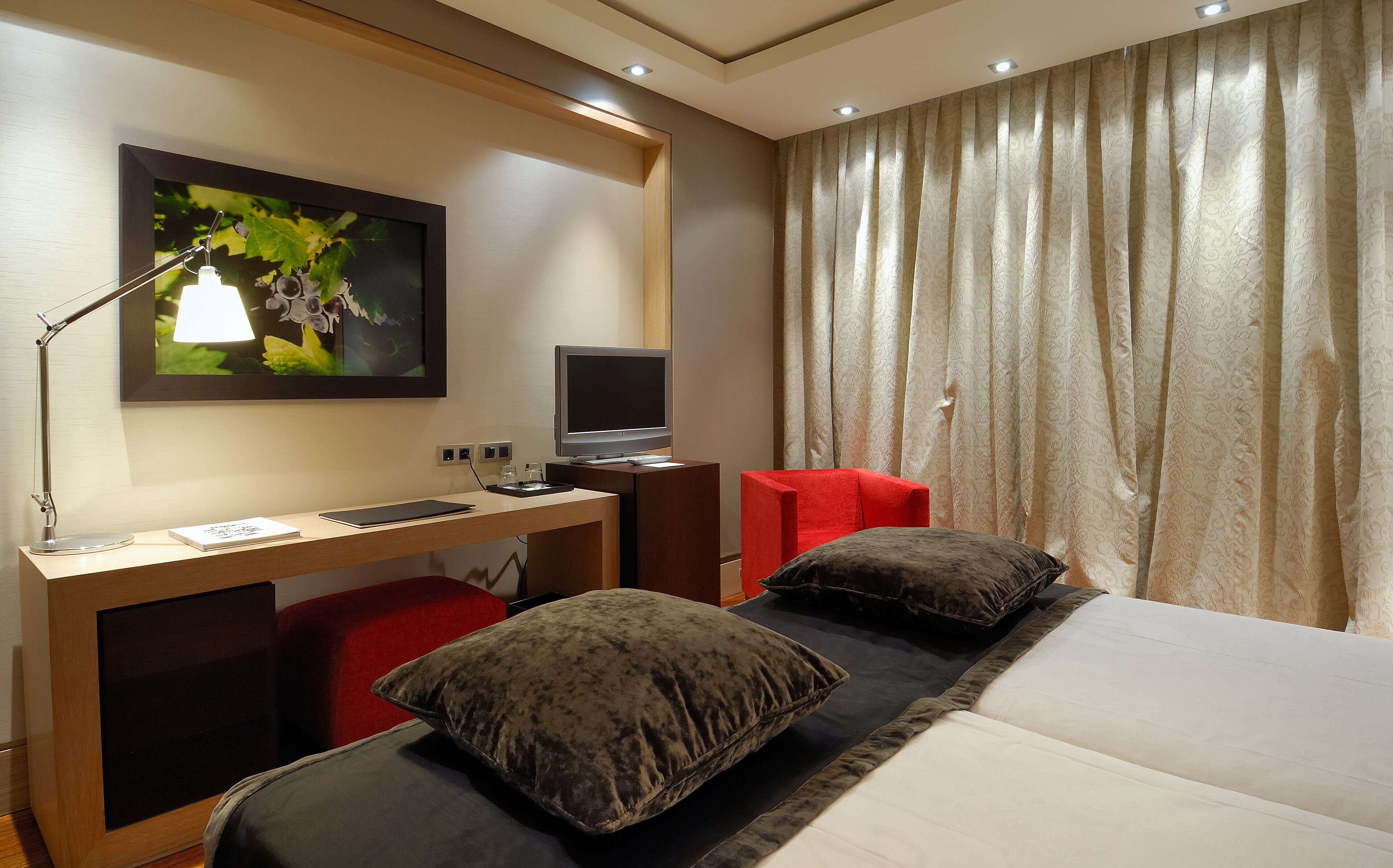Premium bedding, down duvets, minibar, in-room safe