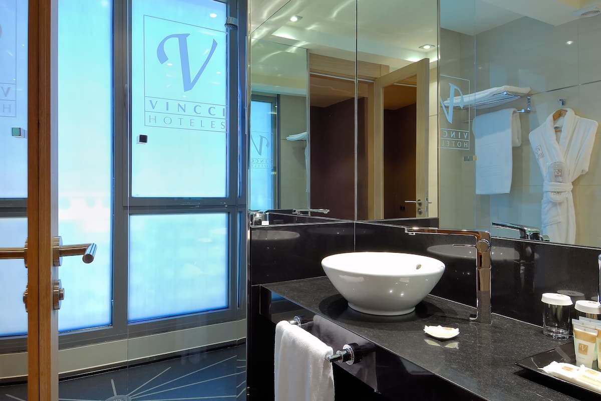 premium bedding, down duvets, minibar, in-room safe