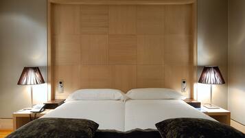 Luxe beddengoed, donsdekens, een minibar, een kluis op de kamer