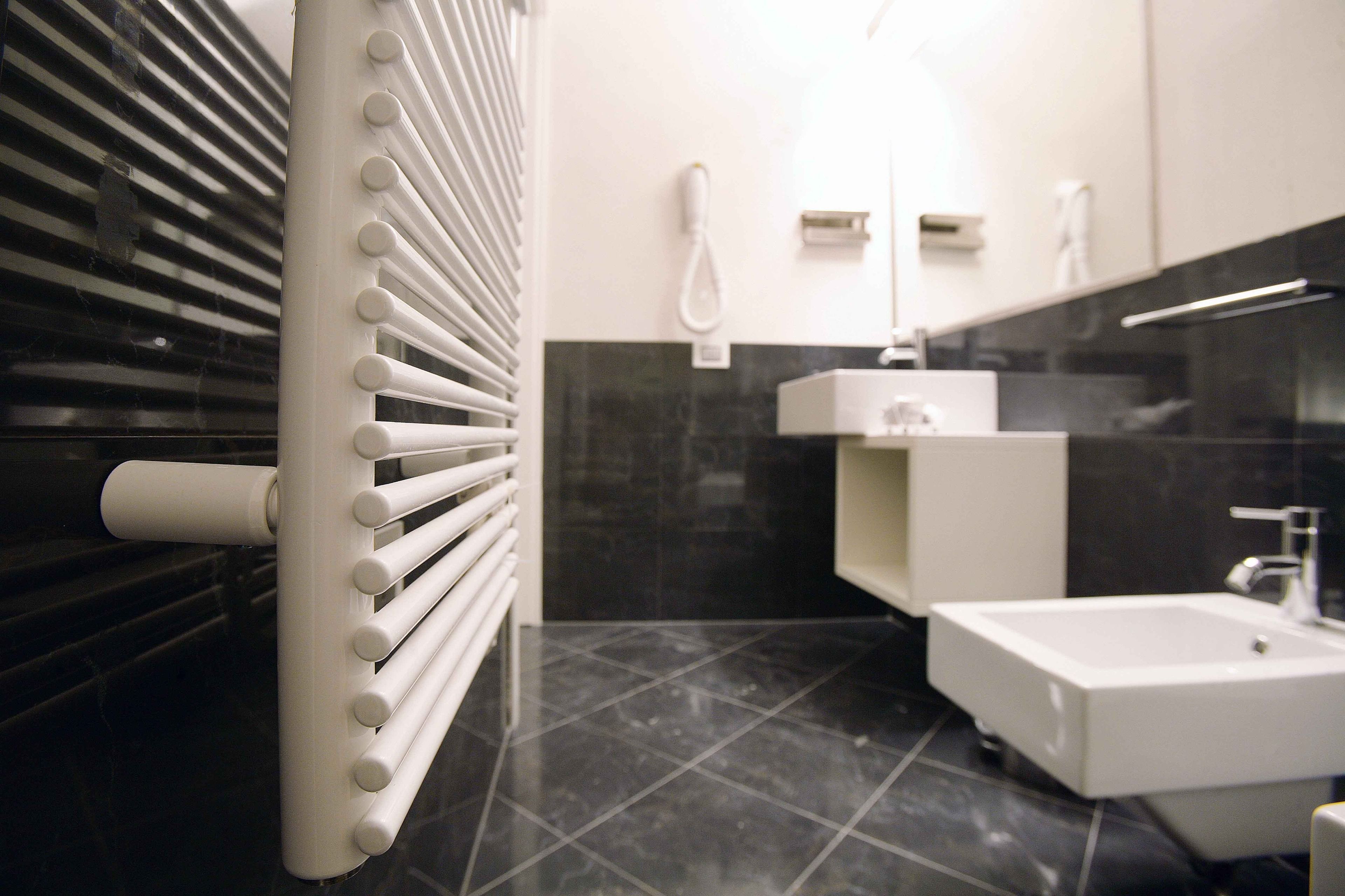 shower, rainfall showerhead, hair dryer, slippers