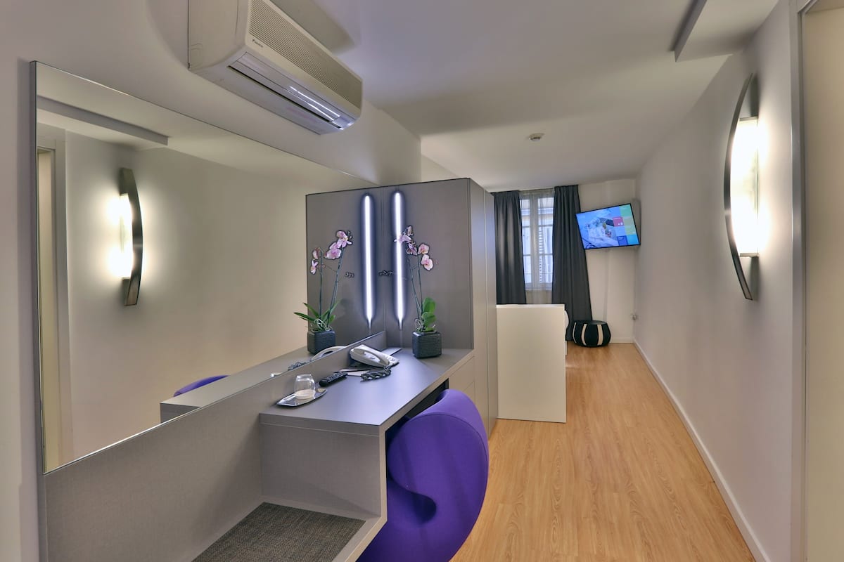 Habitación individual | Ropa de cama de alta calidad, edredón, camas Select Comfort y minibar