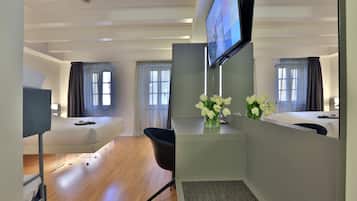 Quadruple Room, Non Smoking | Premium bedding, down comforters, Select Comfort beds, minibar