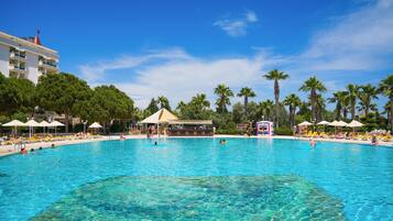 Indoor pool, outdoor pool, free pool cabanas, pool loungers