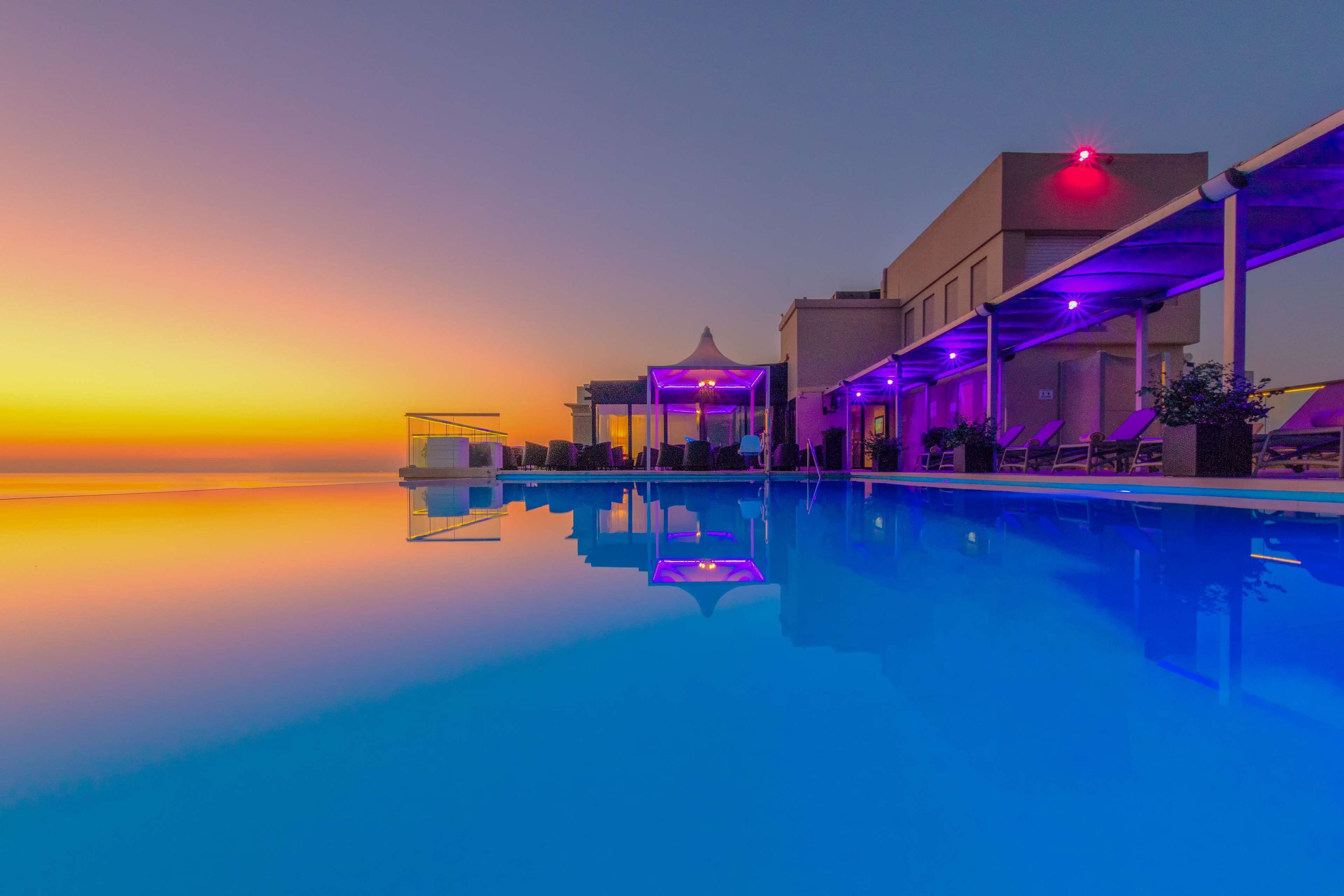 Indoor pool, outdoor pool, pool umbrellas, sun loungers