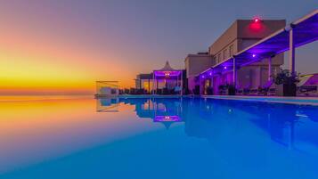 Indoor pool, outdoor pool, pool umbrellas, sun loungers