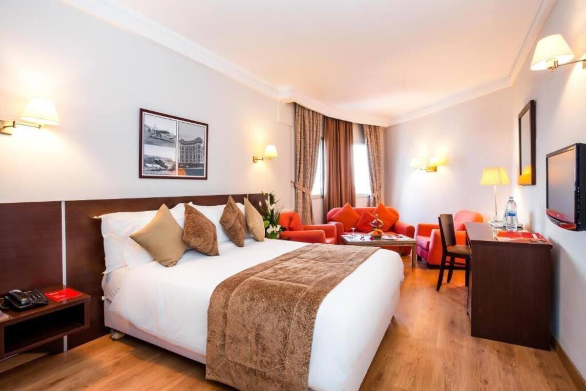 Quartos à prova de som, Wi-Fi de cortesia, roupa de cama