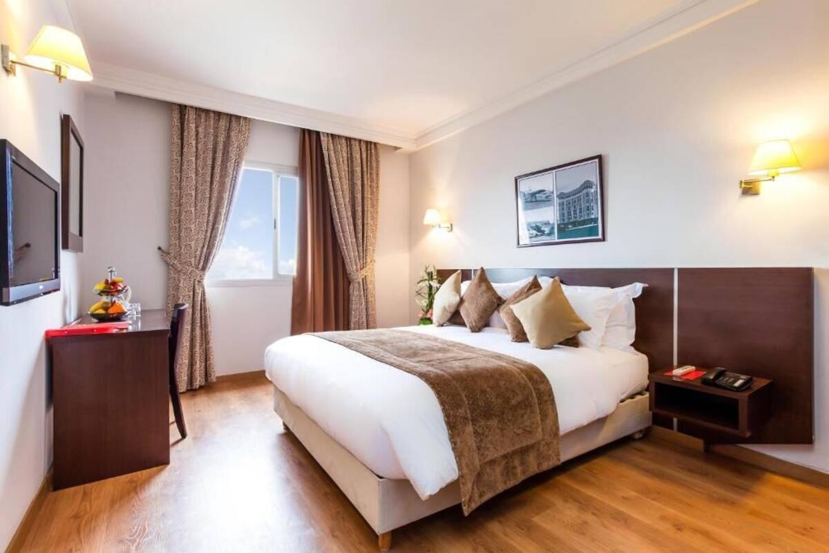Quartos à prova de som, Wi-Fi de cortesia, roupa de cama