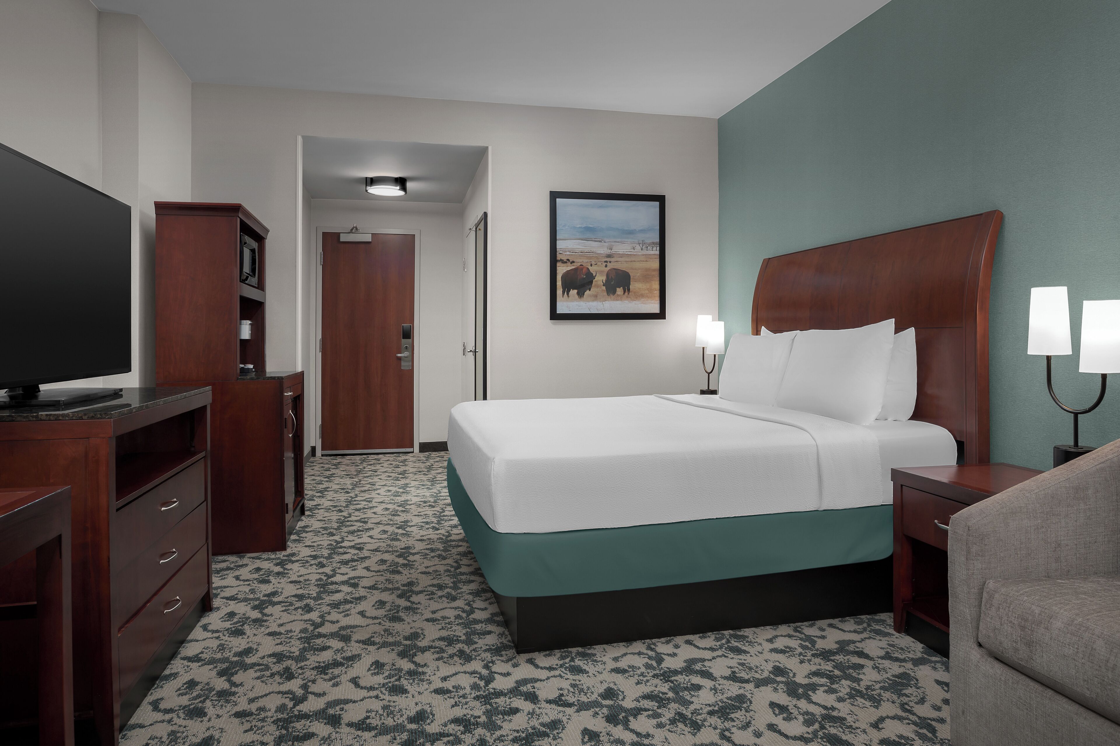 Premium bedding, desk, laptop workspace, iron/ironing board