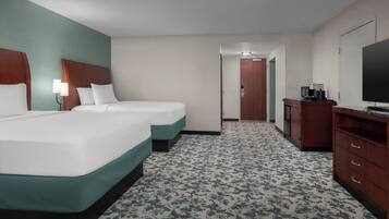 Premium bedding, desk, laptop workspace, iron/ironing board