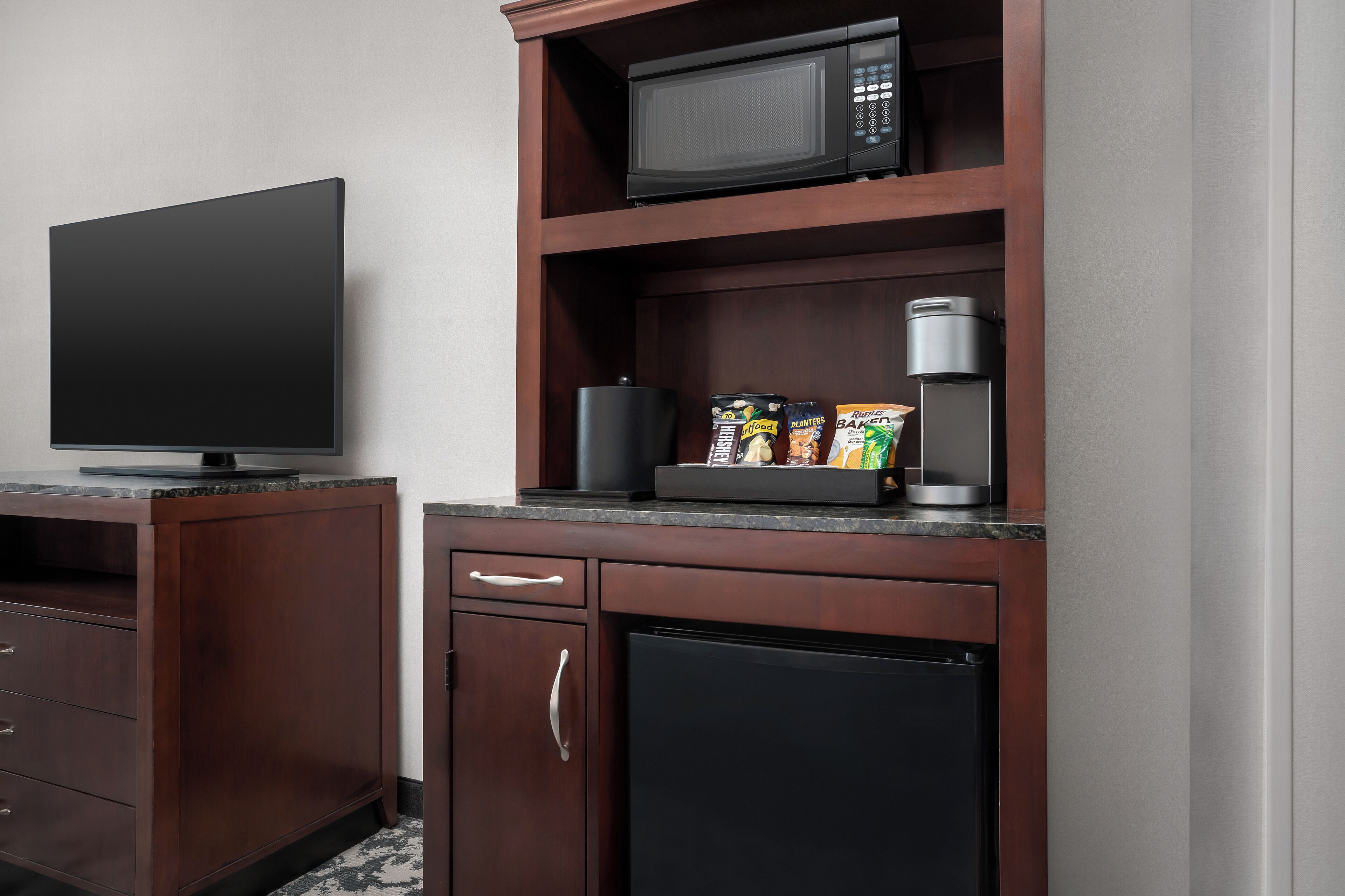 Premium bedding, desk, laptop workspace, iron/ironing board