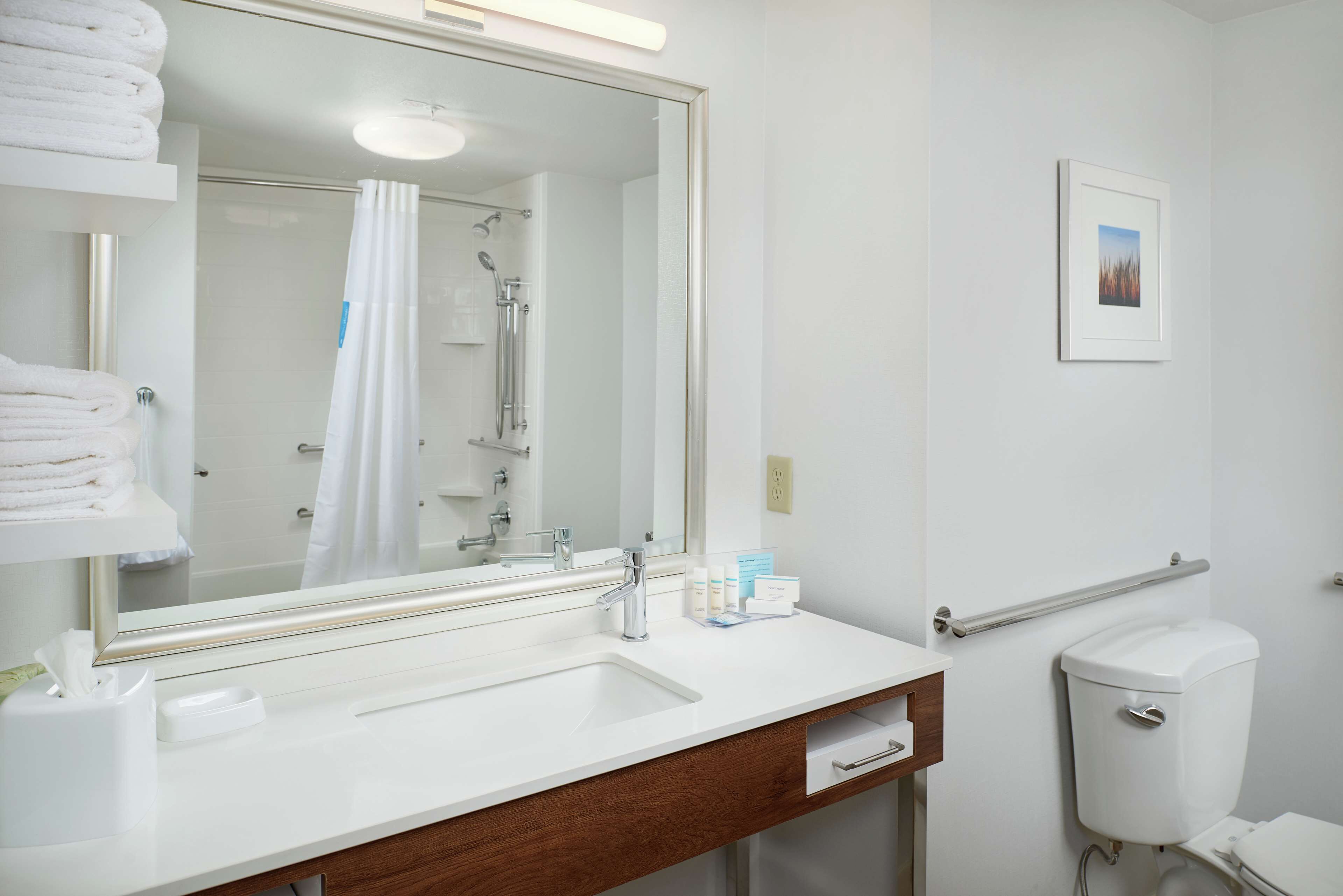 bathtub, hair dryer, towels