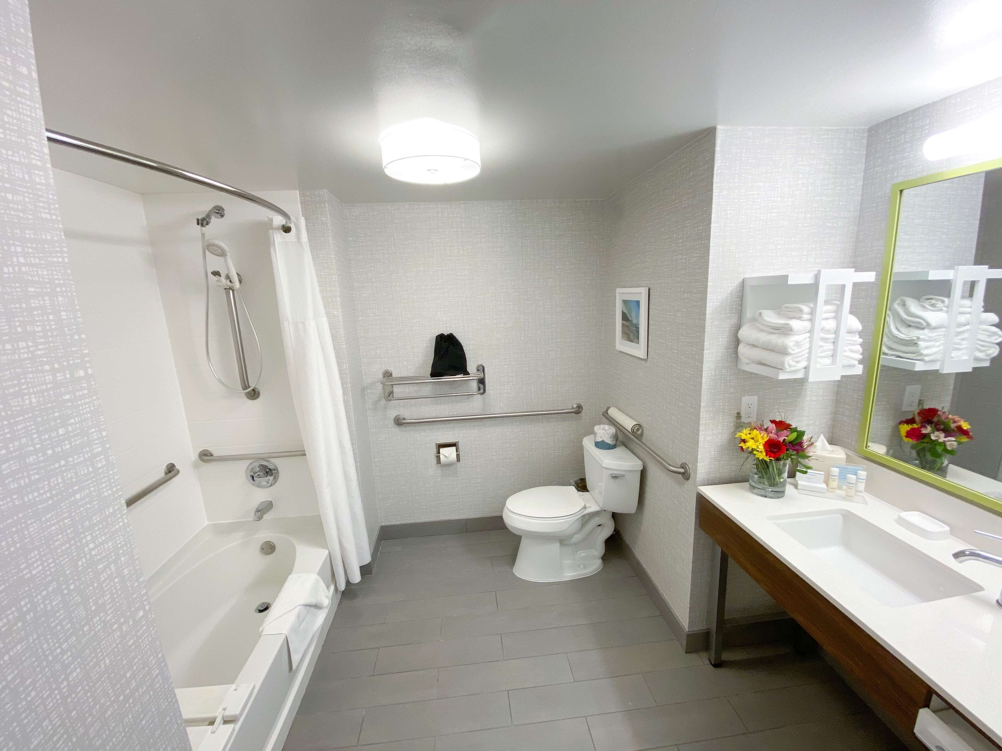 room, 2 queen beds, accessible | bathroom | combined shower/bathtub, free toiletries, hair dryer, towels