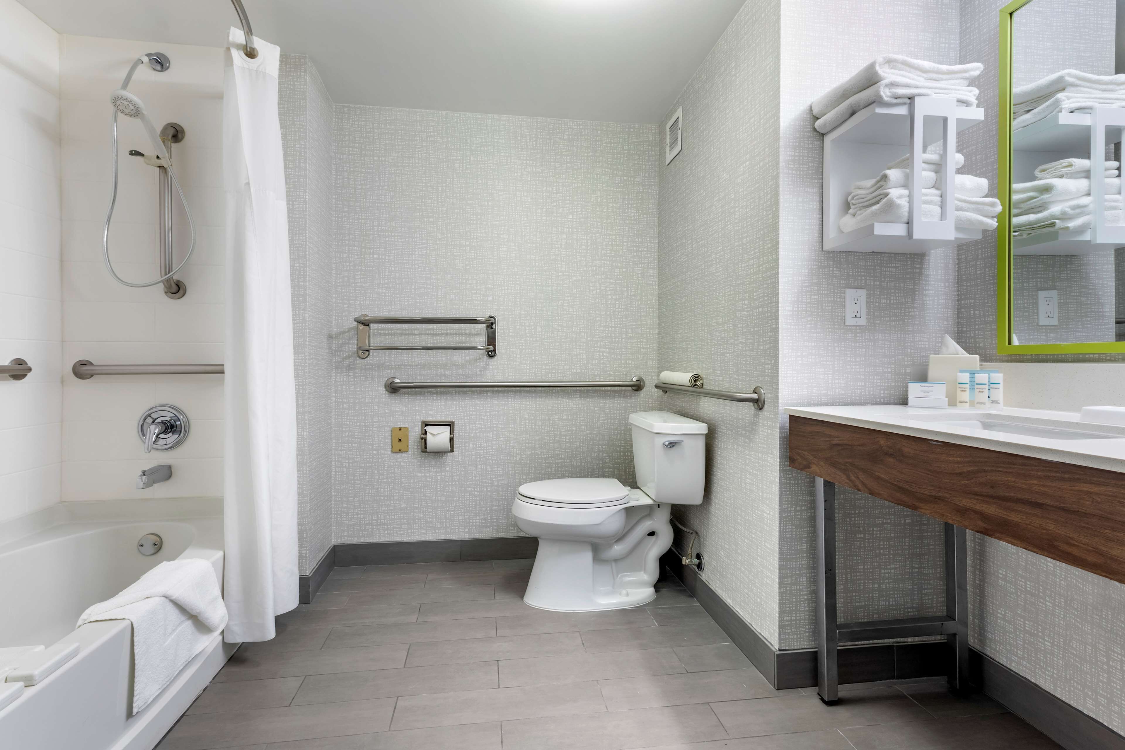 combined shower/bathtub, free toiletries, hair dryer, towels