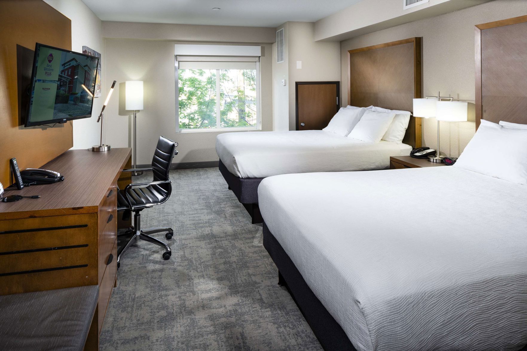 Pillowtop beds, desk, laptop workspace, blackout drapes