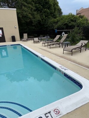 Seasonal outdoor pool, open 8:00 AM to 8:00 PM, pool umbrellas
