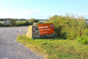 A sign for Eastern Neck National Wildlife Refuge.