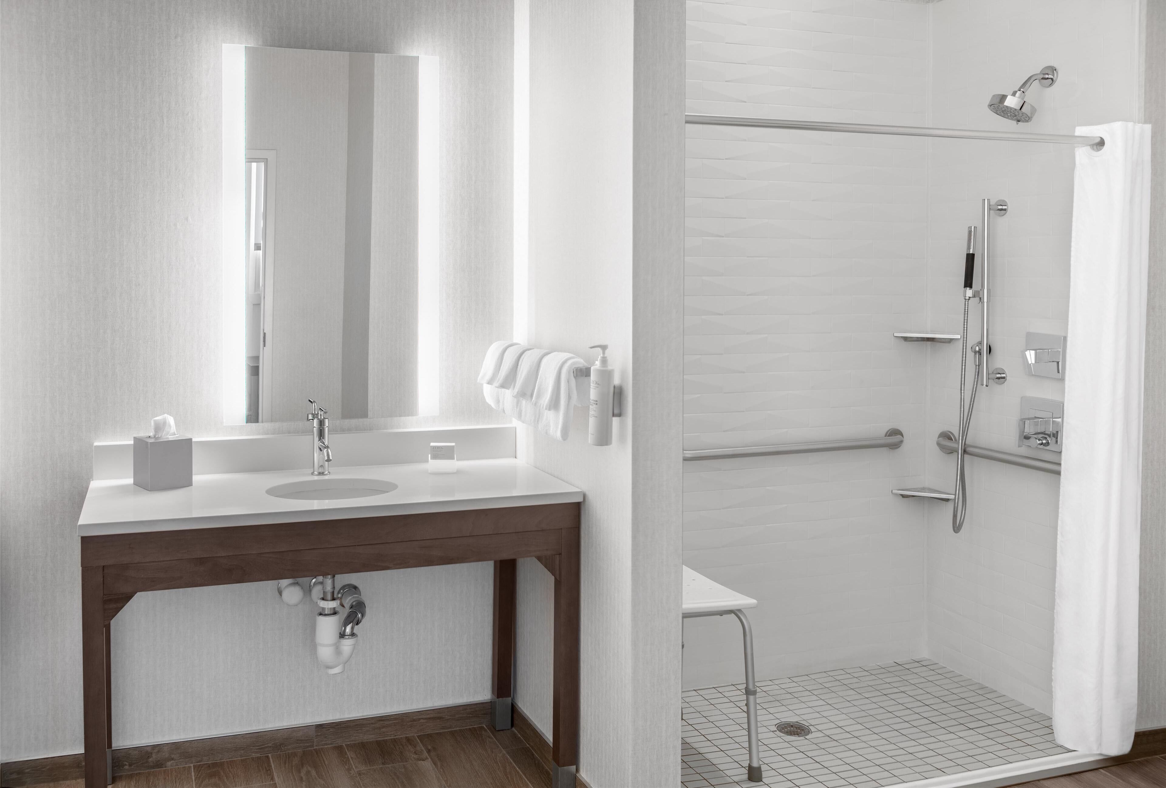 suite, multiple beds, city view | bathroom shower