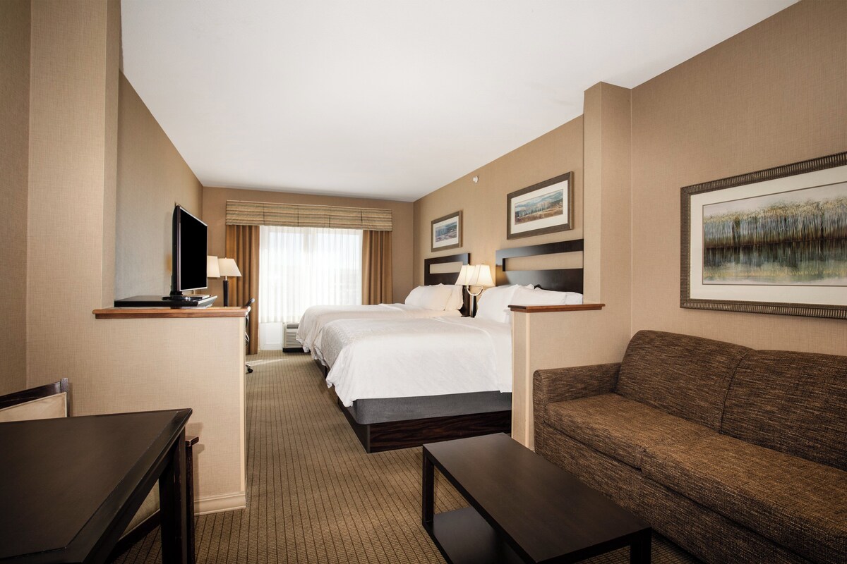 Suite, 1 Bedroom | Desk, blackout drapes, iron/ironing board, cribs (free)