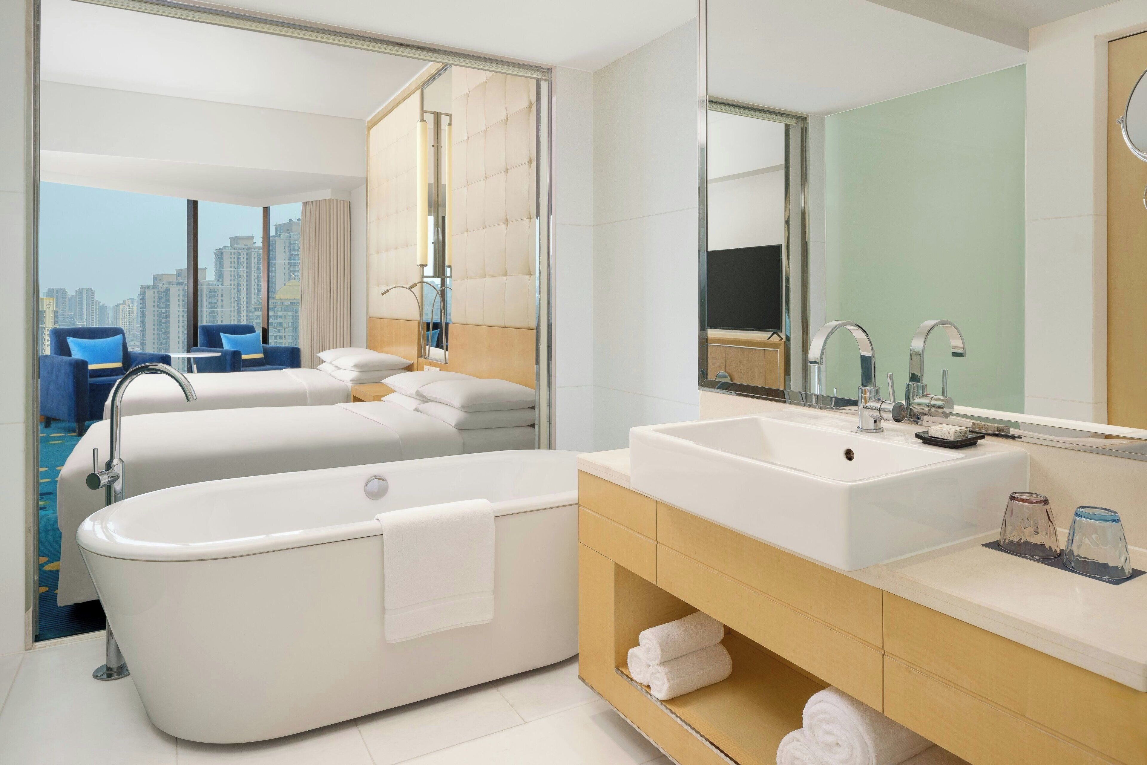 combined shower/bathtub, hair dryer, bathrobes, slippers