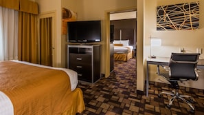 Desk, laptop workspace, blackout curtains, soundproofing - Best Western Windsor Pointe Hotel & Suites-Frost Bank Center (San Antonio)