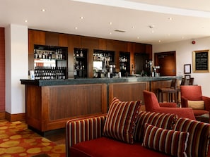 Lobbylounge med utsikt mot golfbanan