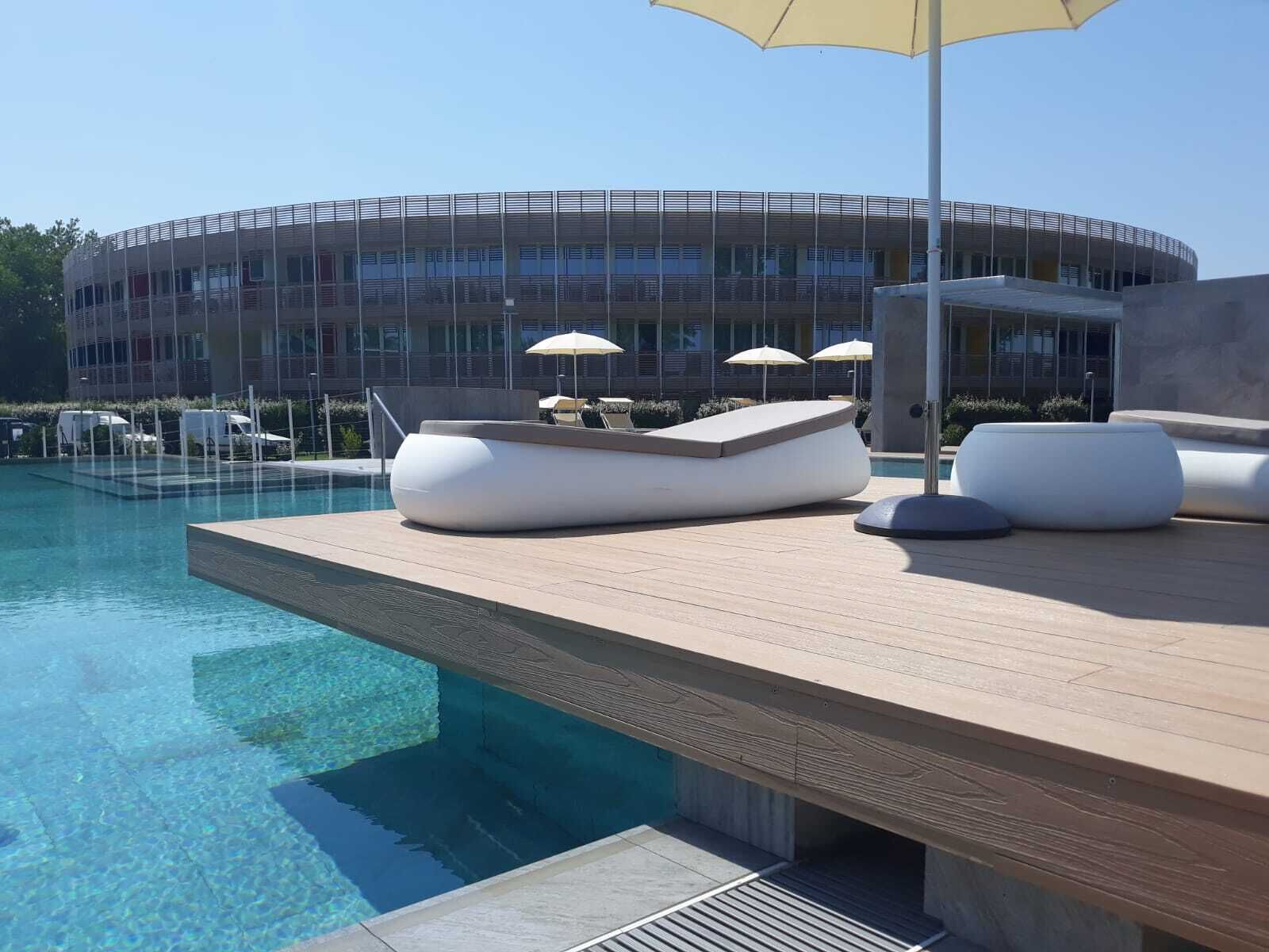 seasonal outdoor pool, pool umbrellas, pool loungers