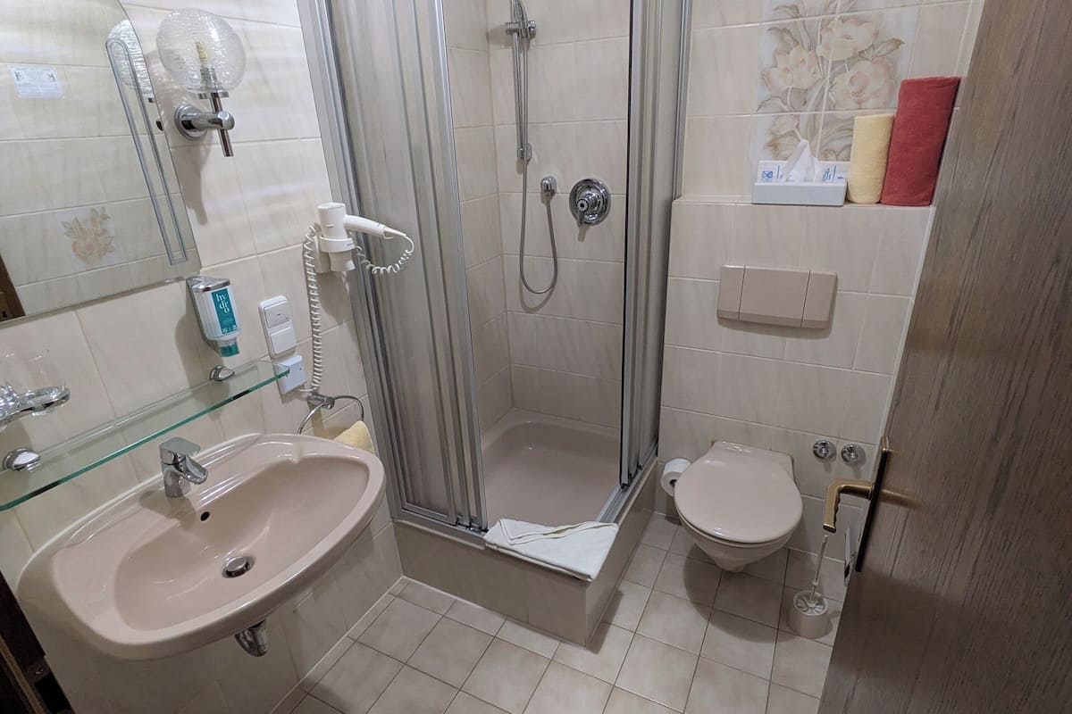 budget double room with air conditioning | bathroom | hair dryer, towels