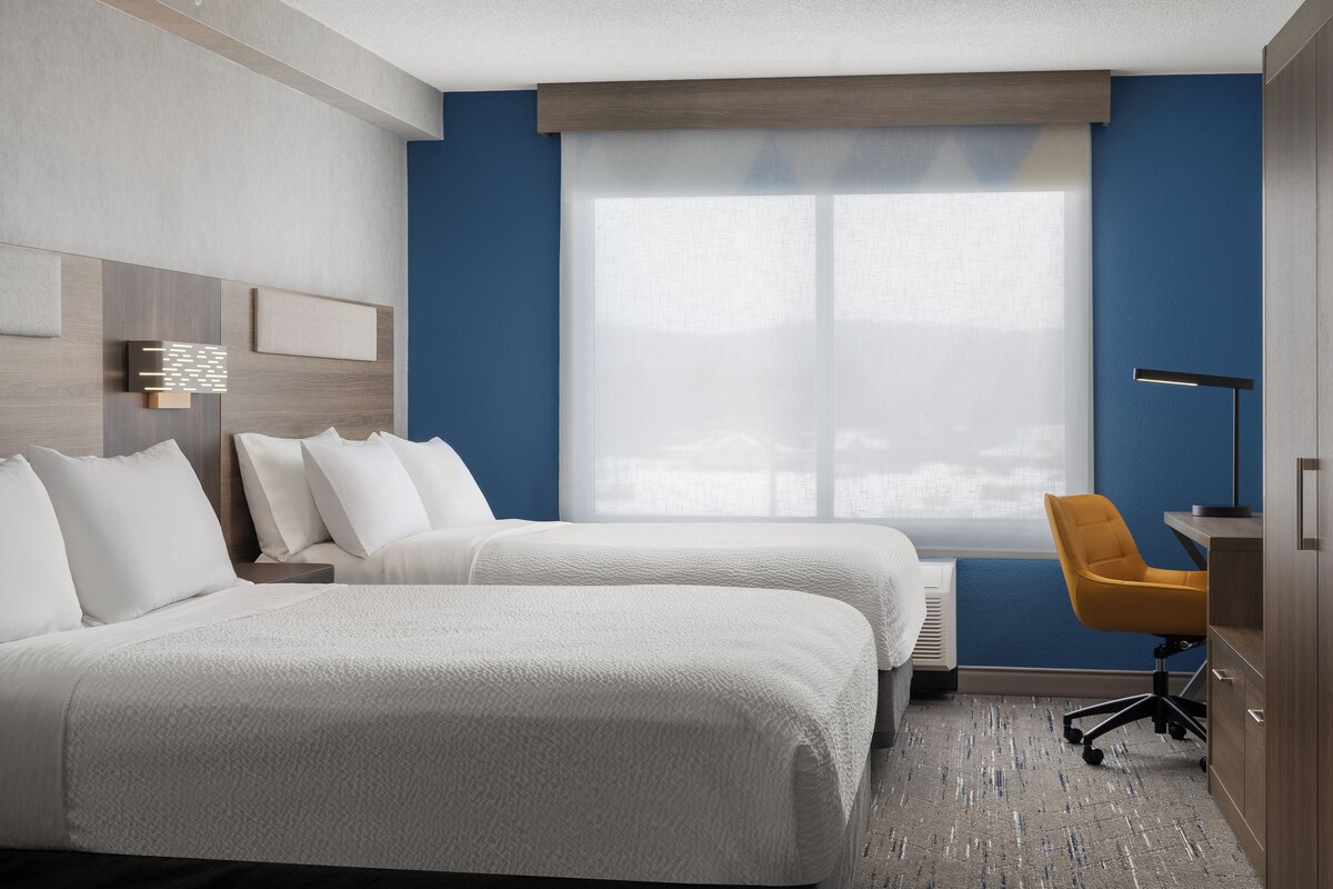 Suite, Multiple Beds (2 Queen Suite Sofa Bed) | Blackout drapes, iron/ironing board, WiFi (free), bed sheets
