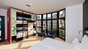 Premium bedding, desk, soundproofing, free cribs/infant beds