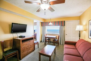 Condo, 1 Bedroom | Living area | Flat-screen TV, DVD player
