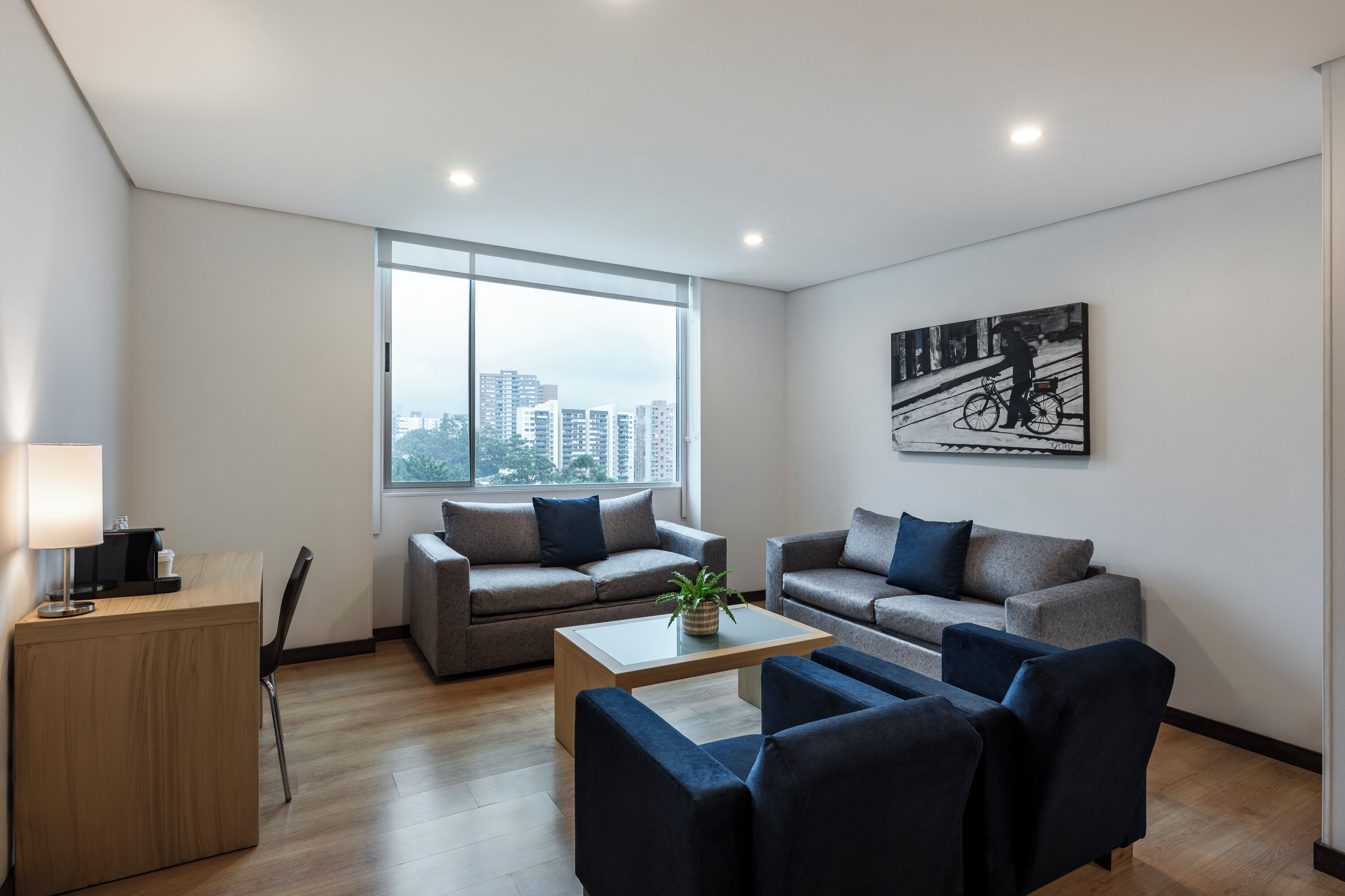 junior suite | living area | 29-inch flat-screen tv with satellite channels, tv