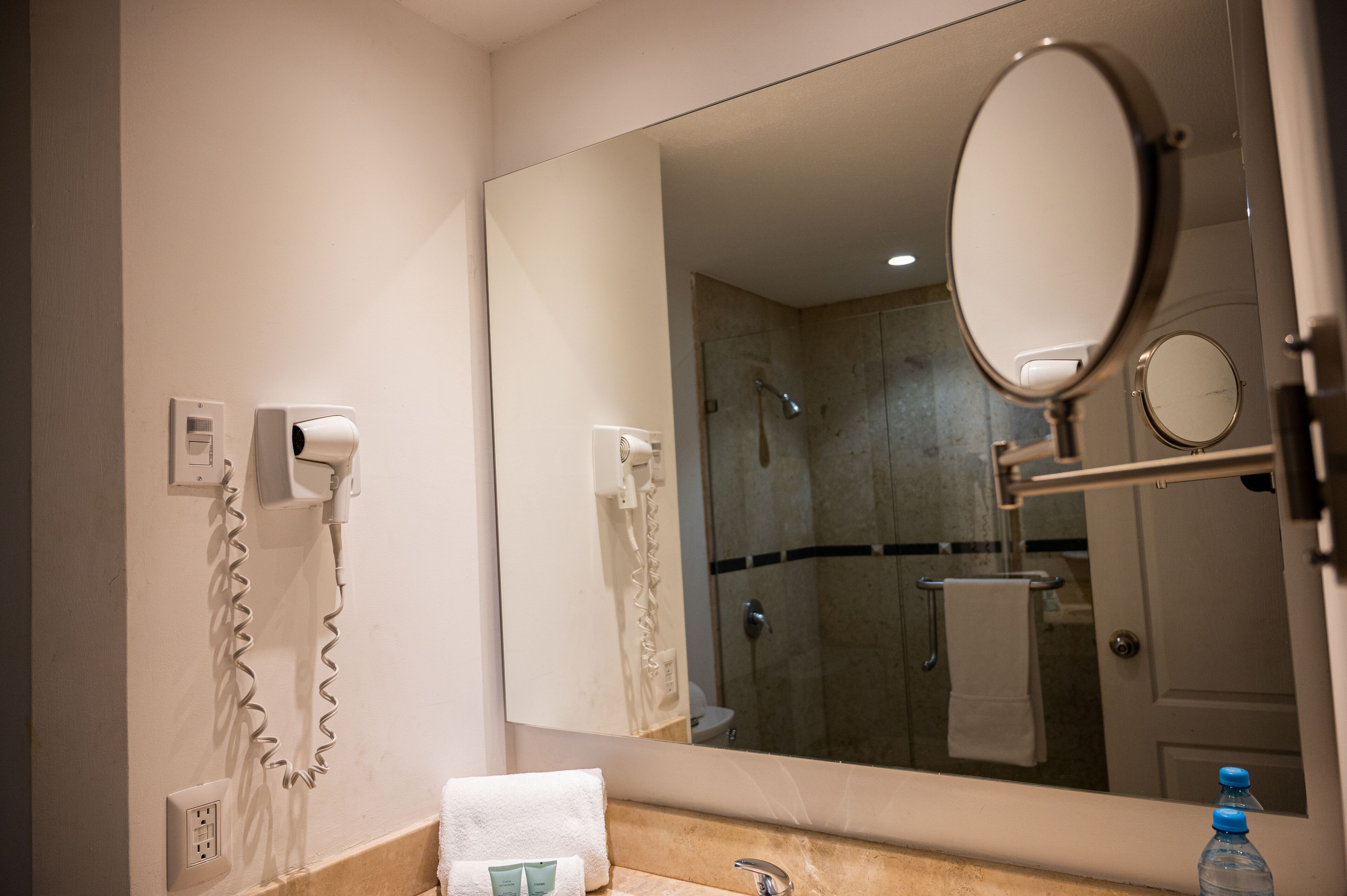 shower, designer toiletries, hair dryer, bidet